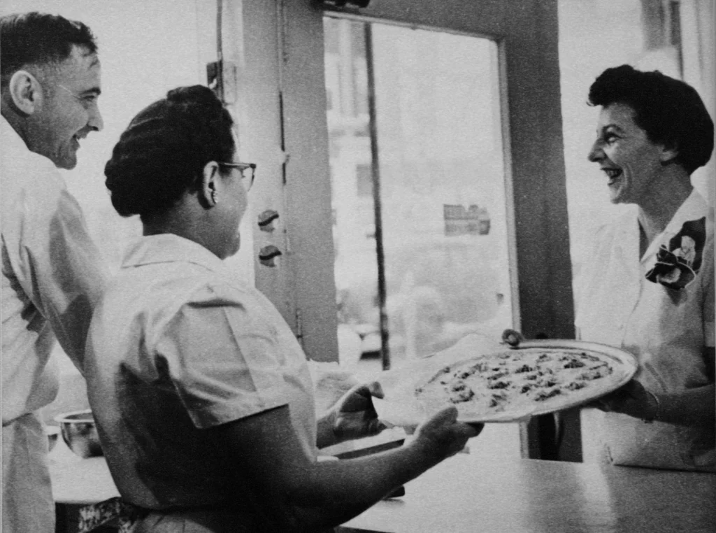 Grandpa Sam Perrella with the cafe servers